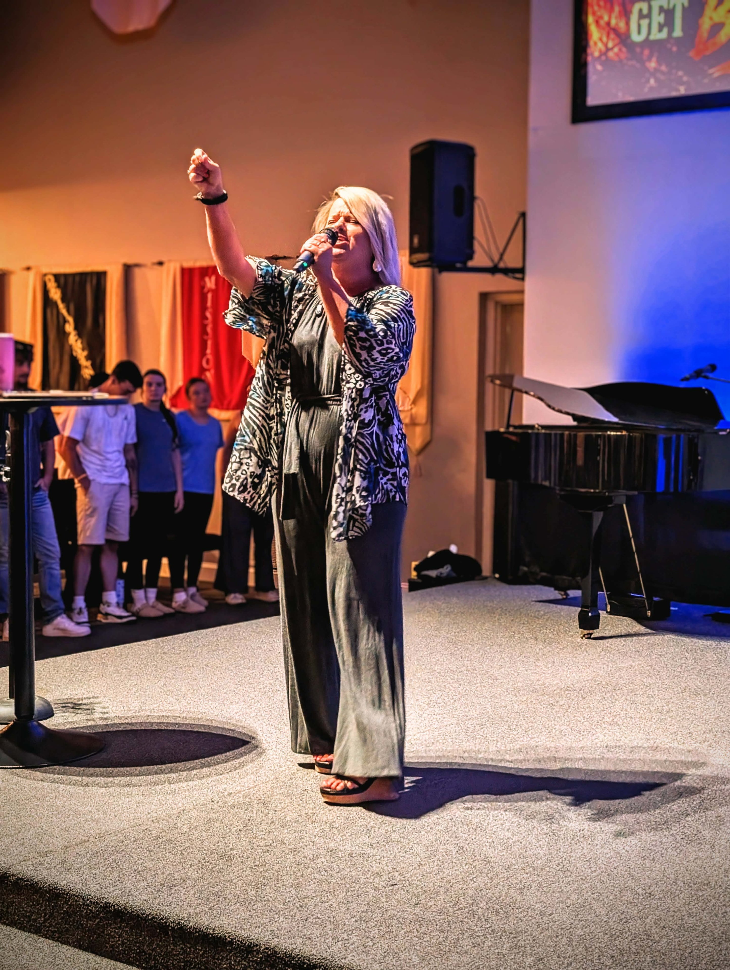 Expressive worship — Pastor Angie leading praise